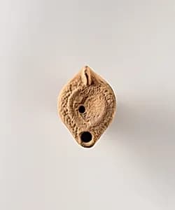 Terracotta oil lamp by Unknown Artist