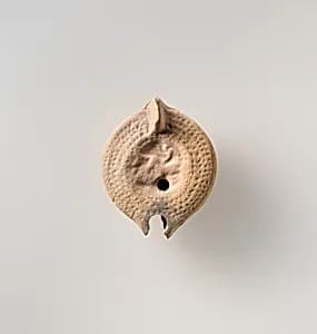 Terracotta oil lamp by Unknown Artist