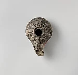 Terracotta oil lamp by Unknown Artist