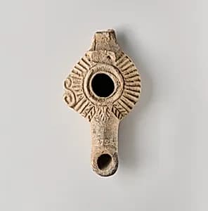 Terracotta oil lamp by Unknown Artist