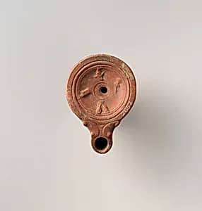 Terracotta oil lamp by Unknown Artist