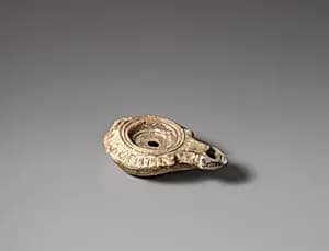 Terracotta oil lamp by Unknown Artist
