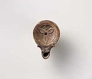 Terracotta oil lamp by Unknown Artist