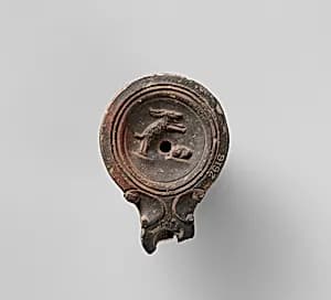 Terracotta oil lamp by Unknown Artist