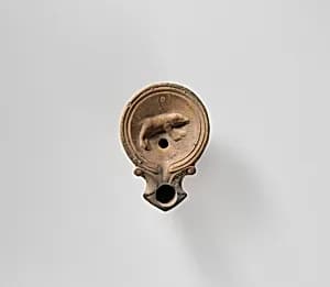 Terracotta oil lamp by Unknown Artist
