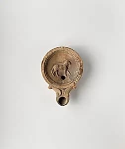 Terracotta oil lamp by Unknown Artist
