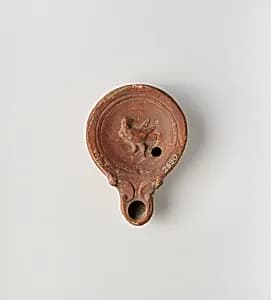 Terracotta oil lamp by Unknown Artist