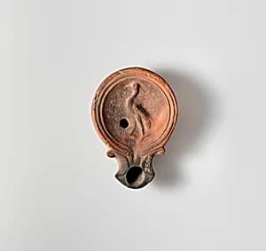 Terracotta oil lamp by Unknown Artist