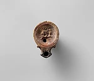 Terracotta oil lamp by Unknown Artist