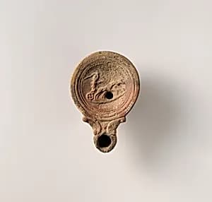 Terracotta oil lamp by Unknown Artist