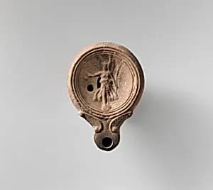 Terracotta oil lamp by Unknown Artist