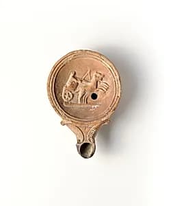Terracotta oil lamp by Unknown Artist