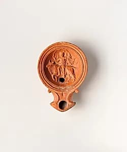 Terracotta oil lamp by Unknown Artist