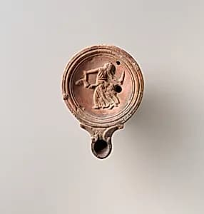 Terracotta oil lamp by Unknown Artist