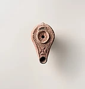 Terracotta oil lamp by Unknown Artist