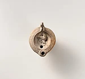 Terracotta oil lamp by Unknown Artist