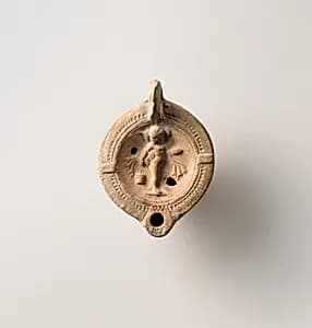 Terracotta oil lamp by Unknown Artist