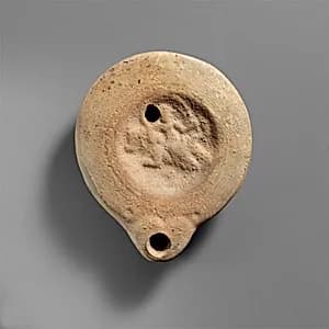 Terracotta oil lamp by Unknown Artist