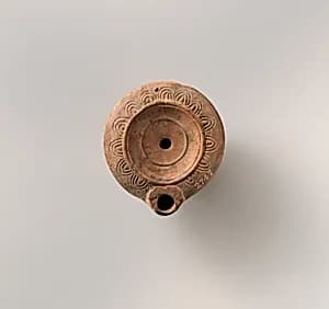 Terracotta oil lamp by Unknown Artist