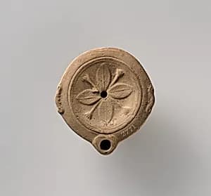 Terracotta oil lamp by Unknown Artist