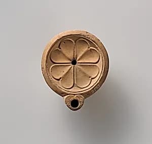 Terracotta oil lamp by Unknown Artist