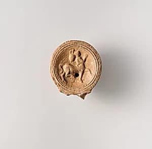 Terracotta oil lamp by Unknown Artist