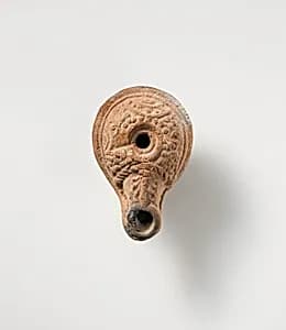 Terracotta oil lamp by Unknown Artist