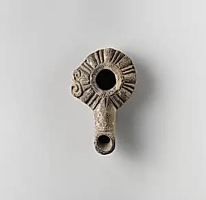 Terracotta oil lamp by Unknown Artist