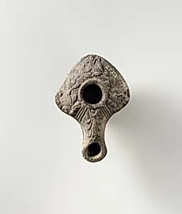 Terracotta oil lamp by Unknown Artist