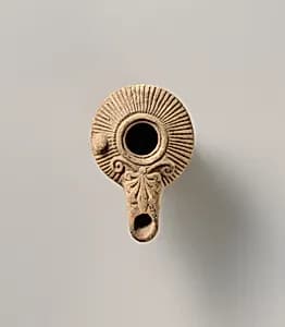 Terracotta oil lamp by Unknown Artist