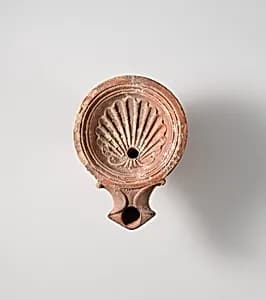 Terracotta oil lamp by Unknown Artist