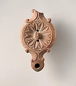 Terracotta oil lamp by Unknown Artist