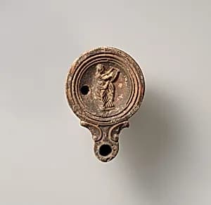 Terracotta oil lamp by Unknown Artist