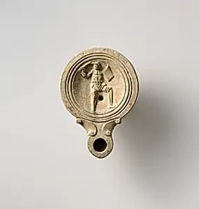 Terracotta oil lamp by Unknown Artist
