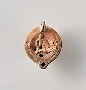 Terracotta oil lamp by Unknown Artist