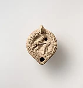 Terracotta oil lamp by Unknown Artist