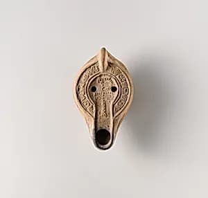 Terracotta oil lamp by Unknown Artist
