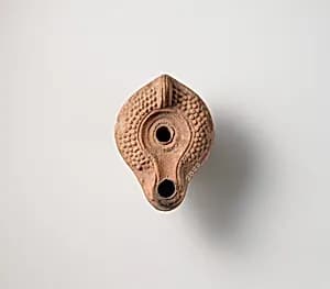 Terracotta oil lamp by Unknown Artist