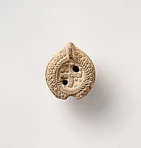 Terracotta oil lamp by Unknown Artist