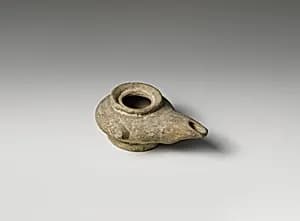 Terracotta oil lamp by Unknown Artist