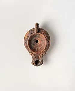 Terracotta oil lamp by Unknown Artist
