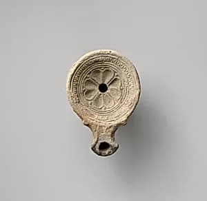 Terracotta oil lamp by Unknown Artist
