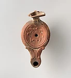 Terracotta oil lamp by Unknown Artist