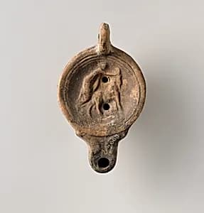 Terracotta oil lamp by Unknown Artist