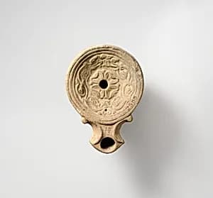 Terracotta oil lamp by Unknown Artist