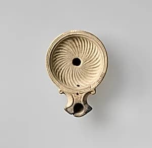 Terracotta oil lamp by Unknown Artist