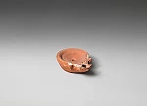 Terracotta oil lamp by Unknown Artist