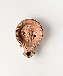 Terracotta oil lamp by Unknown Artist