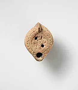 Terracotta oil lamp by Unknown Artist