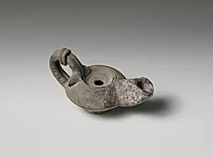 Terracotta oil lamp by Unknown Artist